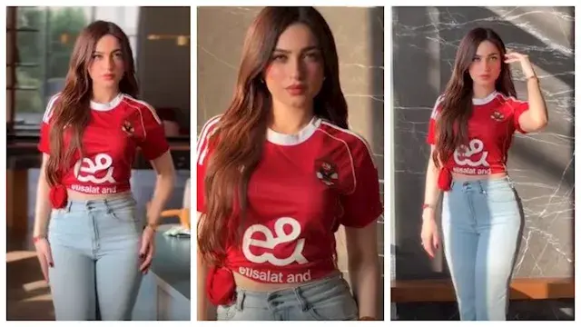بـ تي شيرت الأهلي.. ياسمين عز تدعم القلعة الحمراء في لقاء القمة