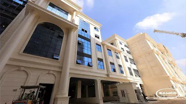 مجمع متعدد الطوابق.. موقف رمسي...
